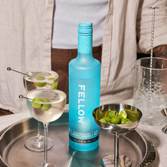 Fellow Saltbush & Olive Vodka On A Tray With Two Dirty Martini's and olives